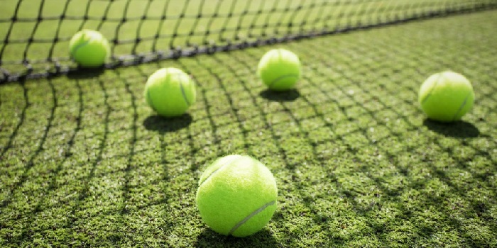Coanda ejector for tennis robots and ball collectors